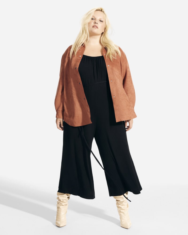 Front of a model wearing a size 1X Saphira Faux Suede Shacket in Terracotta by Truth. | dia_product_style_image_id:229191